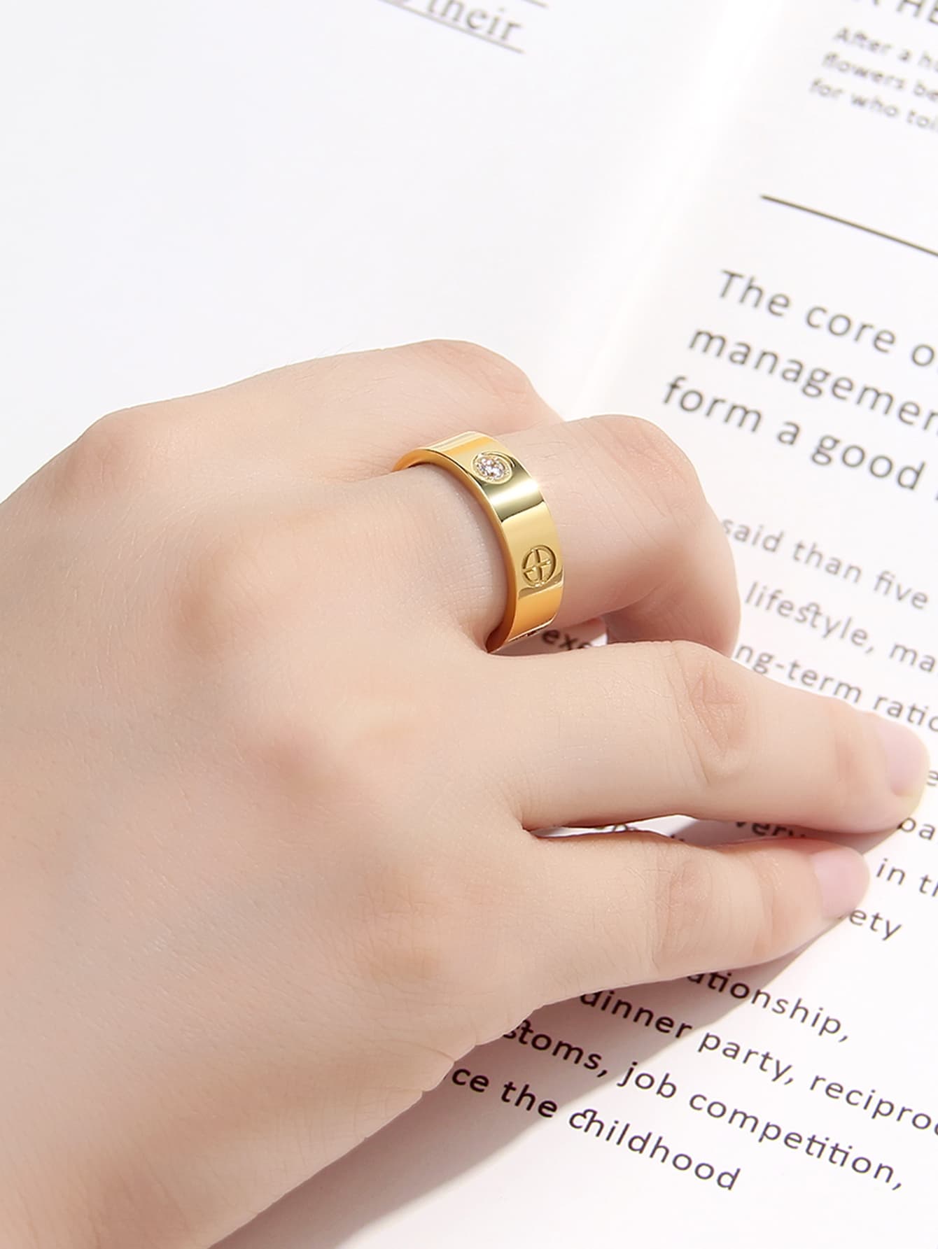 Woman wearing a complete Gold Fidget Spinner Ring